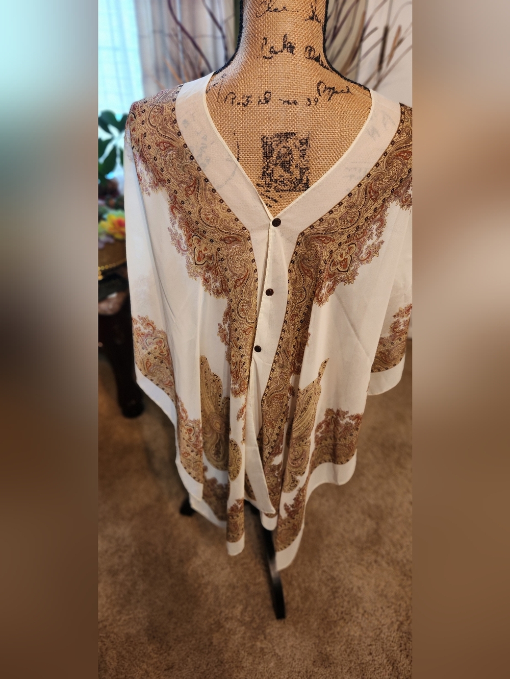 Convertible Tan Paisley Button-Front Ponchos.